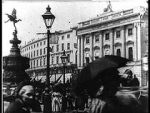 Watch Leisurely Pedestrians, Open Topped Buses and Hansom Cabs with Trotting Horses Megavideo